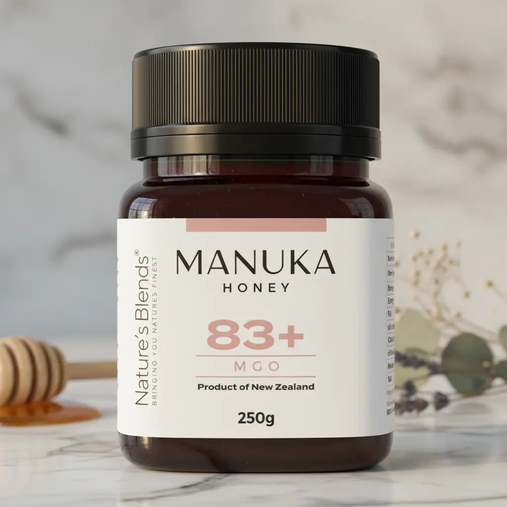 Nature's Blends Manuka Honey 83+ MGO 250g jar close-up marble surface – UK